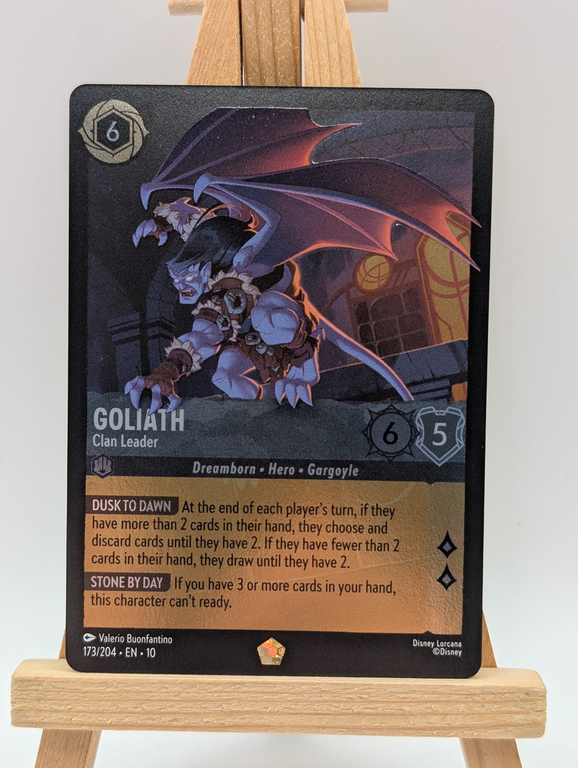 Disney Lorcana Whispers In The Well. Goliath - Clan Leader FOIL 173/204 FRENLY BRICKS - Open 7 Days