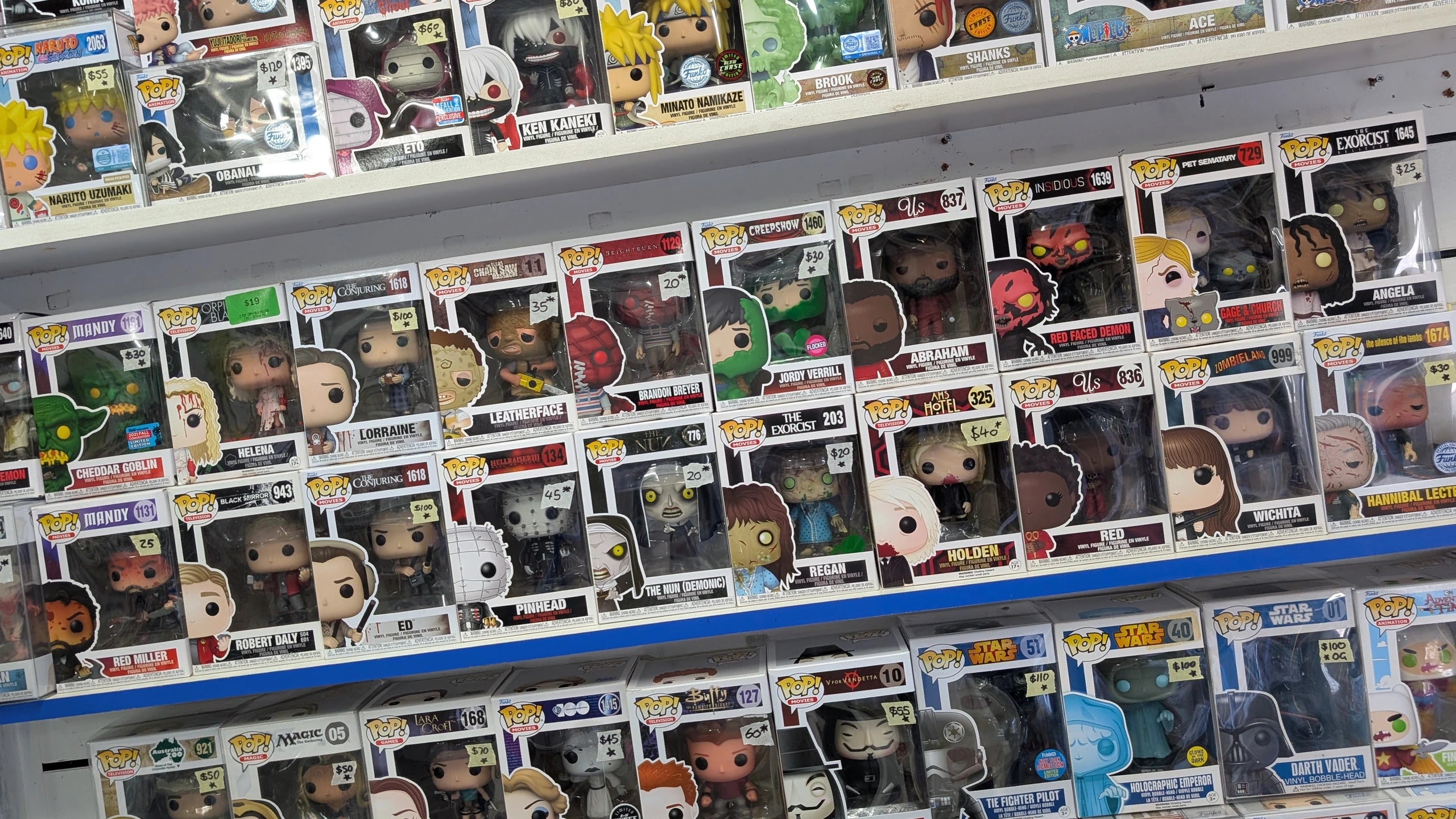Horror, anime and Star Wars Funko Pop shelves inside the real Frenly Bricks Carrara store